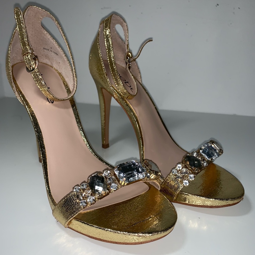 Gold stilettos